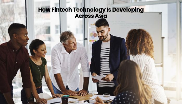 FTAsiaTrading Technology News by FintechAsia: What’s Actually Changing? - finsurancebiz - Finsurancebiz Team discussing fintech growth in Asia for FTAsiaTrading technology news by FintechAsia, highlighting collaboration and financial technology development.