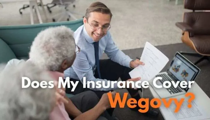 Doctor explaining coverage details to a patient while discussing does my insurance cover wegovy